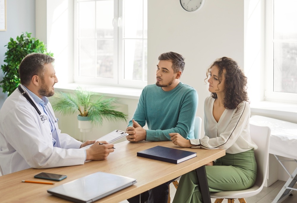 Doctor Talking Meeting Consulting Happy Couple Patients In Fertility Clinic